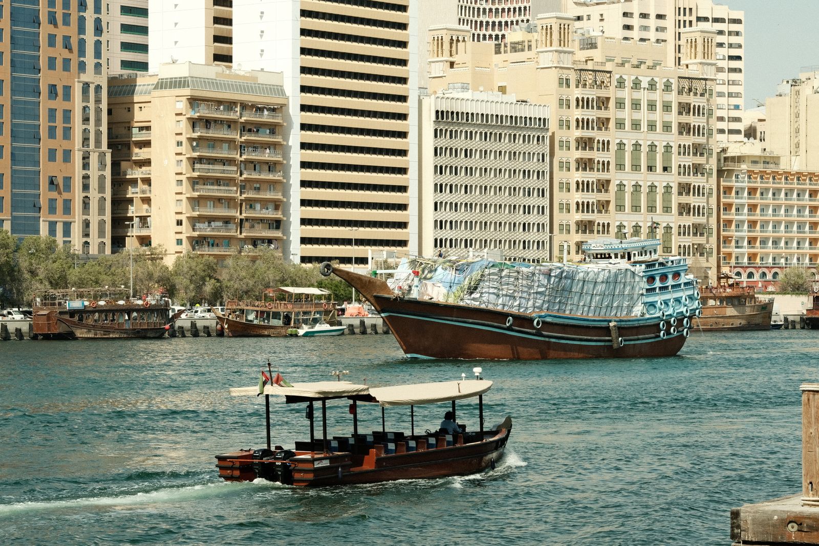 Traditional abra water taxis and dhows on Dubai Creek